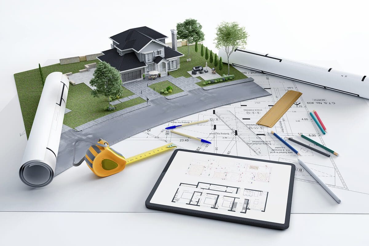 Architectural model with blueprints and tools.